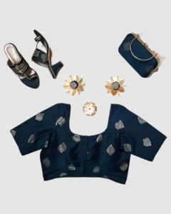 Silk cotton / Banarasi-style silk blend with silver zari-inspired butta motifs.